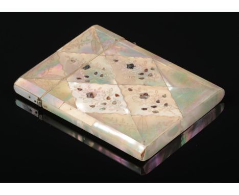 A Victorian mother of pearl parquetry inlaid card case. With floral and foliate incised decoration adorned with abalone shell