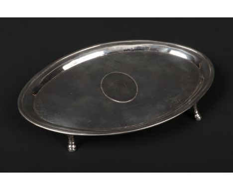 A George III silver lozenge shaped teapot stand by Henry Chawner. With engraved vermicelli border and raised on paw feet. Ass