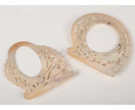Two late 19th / early 20th Chinese carved mother of pearl photograph frames. Both with pierced scrollwork and one with a tige