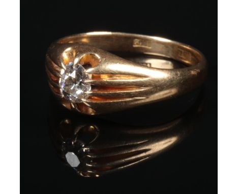 A gentleman's 18 carat gold solitaire diamond ring. Set with an oval old cut diamond 5mm x 4mm, 4.9 grams, size N.  Good cond