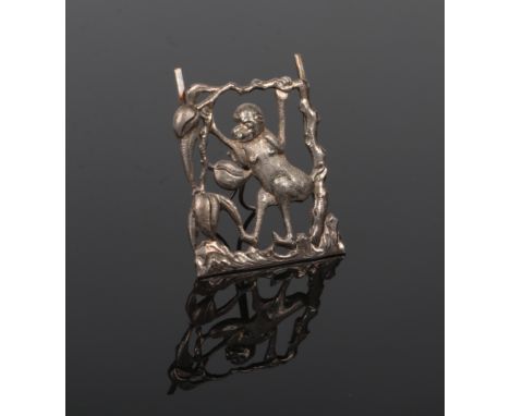 A Chinese silver menu or place name holder of easel form. Decorated with a monkey swinging from the branch of a peach tree. P