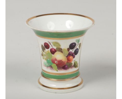 A small Rockingham trumpet shaped spill vase. Green ground, with gilt banding and painted with a panel of fruit. Printed puce