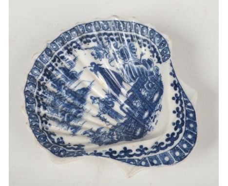 A Caughley shell moulded pickle dish. Printed in underglaze blue with the Fisherman and Cormorant pattern. Printed S mark c.1