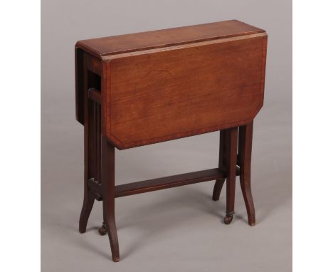 A Victorian mahogany Sutherland occasional table crossbanded in satinwood, 62cm wide.  Under tier detached with a split to on