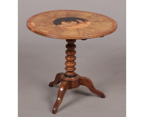 A 19th century Sorrento ware centre pedestal olive wood occasional table. With a marquetry panel to the top depicting figures