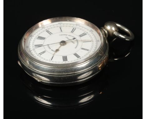 A Swiss silver cased centre seconds chronograph pocket watch with enamel dial and key, 55mm wide.  Running. Side button not f