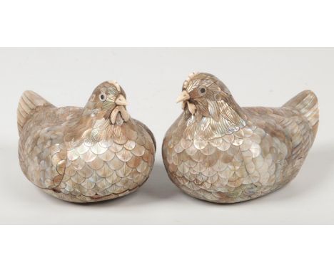 A pair of 19th century Chinese mother of pearl and ivory hen formed boxes, 16.5cm.  Some very slight losses and chips.