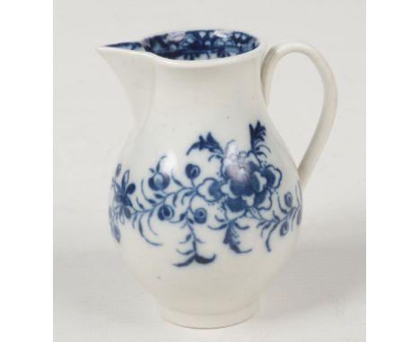 A Caughley sparrow beak cream jug with reeded loop handle. Printed in underglaze blue with the Peony pattern c.1775, 9cm.  Go
