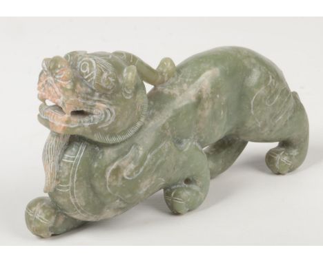 A Chinese carved jade coloured hardstone statue of a mythical beast, 19cm.  Good condition. No cracks or chips.