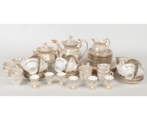 A comprehensive Coalport Neo-Rococo tea and coffee service. With grey ground borders embellished with seaweed gilding. Compri