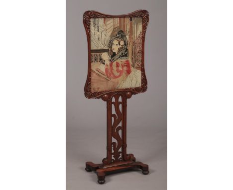 A William IV rosewood facescreen. With needlework panel depicting the portrait of a praying maiden. Raised on an open fretwor