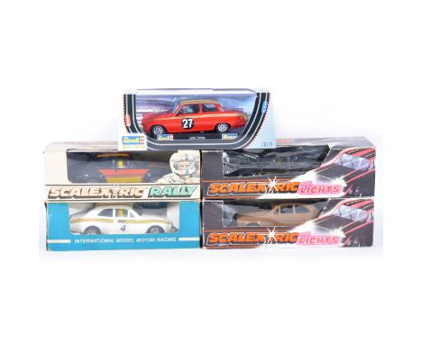 Five Scalextric slot-car racing models; including C052 Ford Escort Mexico Special Build, C109 Ford Escort, C188 Ford Escort w
