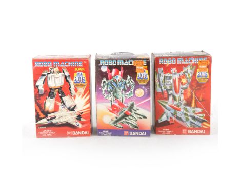 Robo Manchine by Bandai; three transforming toys including Vamp Enemy Robot, Leader-1 Friendly Robot, Spy-Eye Friendly Robot,