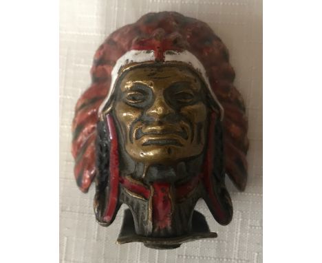 An Indian chief commercial vehicle mascot in enamel painted brass. Approx 6cms h x 5.5cms w.Condition ReportMinor chip to the