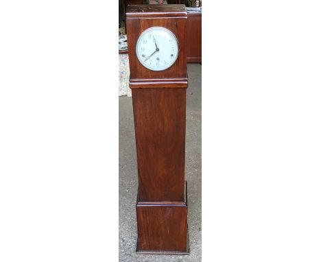 A mahogany cased granddaughter clock with Westminster chime. 126cms h x 30cms w x 21cms dCondition ReportSide beading missing