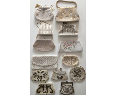 A collection of 13 white coloured handbags with beads and sequins in various designs and shapes. One bag made by Sharonee. La