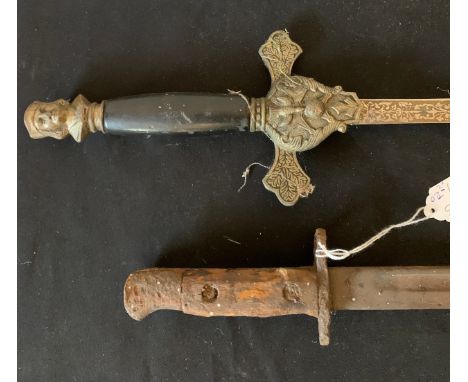 An early 20thC American Masonic dress Sword with double edge blade with engraved details marked knights of Columbus with swol