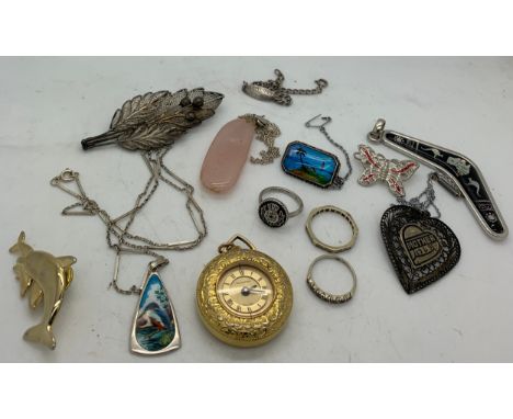 A selection of jewellery to include silver and enamel lady's pocket watch etc. In a wood and brass inlaid box.