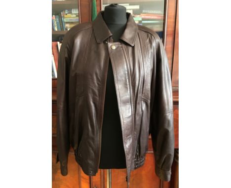 Three lined gentleman's leather jackets to include a brown bomber style size medium, a black medium length jacket and a Harro