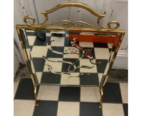 A brass framed decorative mirrored firescreen. 77 x 46cms.Condition ReportFairly good condition.