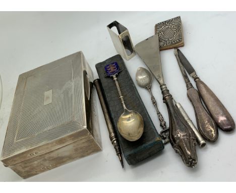 A miscellany of mainly hallmarked silver to include a cigarette box , 2 manicure tools, penknife, shoe horn,  spoon marked 80