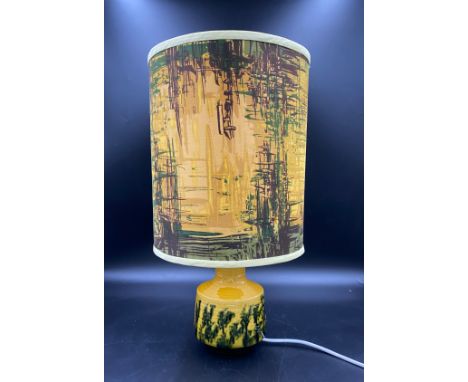 A Mid Century ceramic lamp with a matching contemporary shade. 49cms h to top of shade. 49cms h.Condition ReportGood conditio