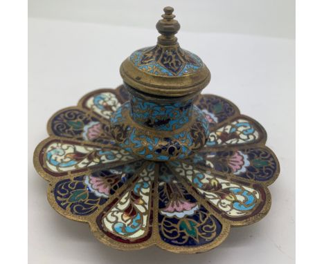 A brass and enamel champlevé  inkwell 7.5cms h with glass liner.Condition ReportGood condition.