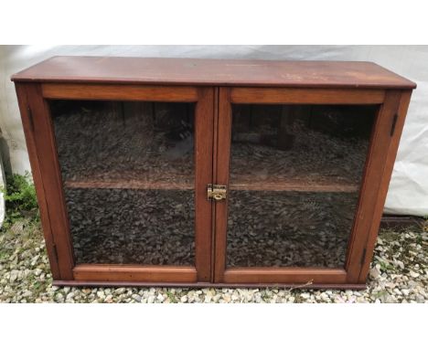 A mahogany glazed door display cabinet with single shelf 92cms w x 27.5cms d x 63cms h.Condition ReportSurface scratches and 