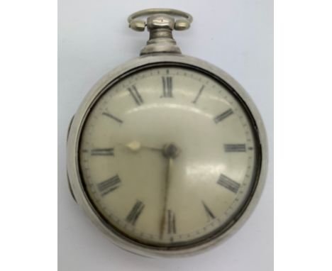 A silver pair cased pocket watch with enamel face with Roman numerals. Both cases with makers marks, IG London 1815, probably