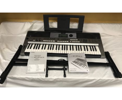 A Yamaha Keyboard PSR E443. Digital with keyboard stand and manual booklets. Condition ReportVery good condition, hardly used