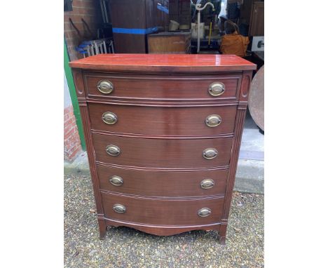 An Edwardian five height mahogany chest of drawers on bracket feet with brass handles.89cms w x 52cms d x 121cms h. Condition