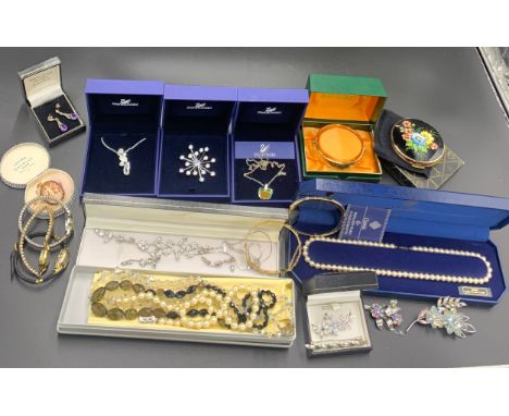 A quantity of costume jewellery to include Swarovski, Lotus shell cameo brooch, earrings, Stratton compact, rolled gold bangl