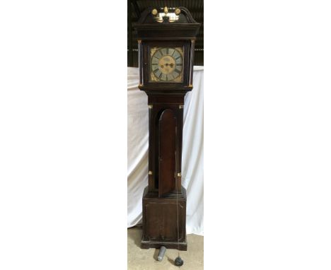 An oak cased granddaughter clock, Matthew Bushell, with steel cut dial and decorative brass embellishments. 208cms h x 44cms 