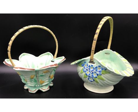 Two Burslem floral painted ceramic baskets with wicker handles. Tallest 27cms h.Condition ReportGood condition.