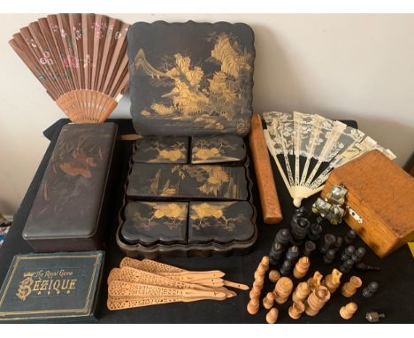 A miscellany comprising fans, oriental laquer boxes, part chess set, photograph frame etc.Condition ReportAll items a/f.