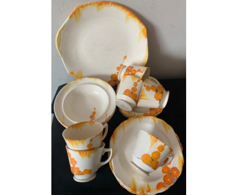 A vintage "Ivory" part tea service comprising 6 plates, 4 saucers, 3 bowls, large plate, 6 cups.Condition ReportOne saucer wi
