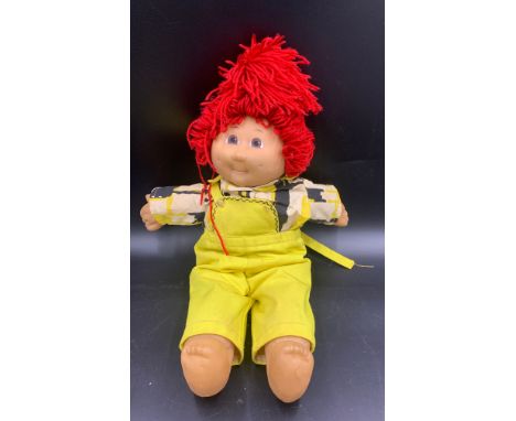 Vintage Cabbage Patch doll. 49cms h.Condition ReportDungarees lacking button.