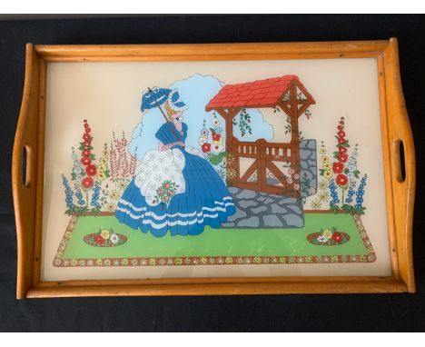 A Vintage glass galleried tray depicting a lady in a garden. 32 x 52cms. Condition ReportSlight wear to wood.