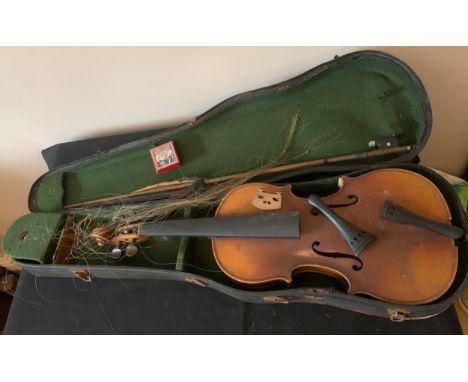 A vintage violin and bow in case.Condition ReportIn need of restoration.