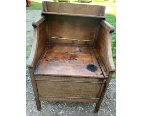 A 19thC mahogany commode.Condition ReportStains and cracks to wood. No pot, old woodworm to interior.