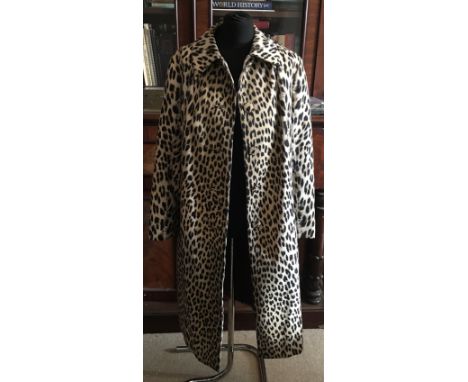 A long leopard print over coat by Lanvin, Paris. Measures from underarm to underarm 54cms and shoulder to bottom 102cms.Cond: