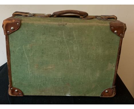 A vintage canvas and leather suitcase. 51 x 37cms.Condition ReportWear to leather.