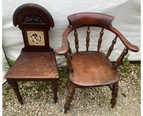 A smokers bow armchair together with a 19thc hall chair with tile to the back.Condition ReportCrack to back of hall chair and