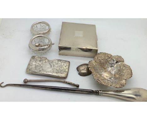 Silver to include card holder, bonbon dish, glass &amp; silver salts, cigarette box, button hook etc.Condition ReportCase &am