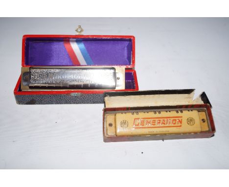 Chromatic harmonica together with 1 other 