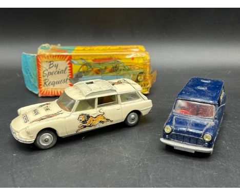 Corgi 448 Austin Police mini van in Fair condition along with Corgi 475 Citreon Safari (Poor) in white, missing roof rack and