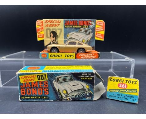 Corgi 261 James Bond's Aston Martin DB5 - operational showing very few chips in Fair box with Good inner pictorial display(30