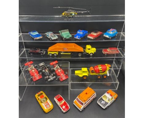 Corgi vehicles (17) and a Corgi Bell Jetranger Helicopter. 18 total items.(2300g). Condition Report: - Vehicles - Fair