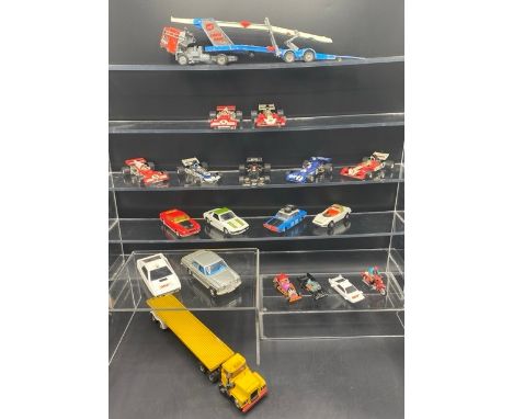 Corgi vehicles including Whizzwheels and F1 racing cars (7). Motorcycle make is unknown. 19 total items.(2500g). Condition Re