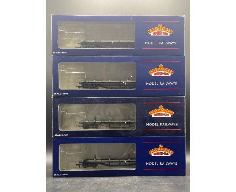 Four boxed Bachmann Branchline 33-856A 30 ton bogie bolster wagon in BR grey B943405(500g). Condition Report: - Rollling Stoc